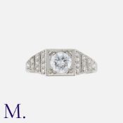 A Diamond Ring in 18K white gold, set with a diamond weighing approximately 0.65ct to the centre and