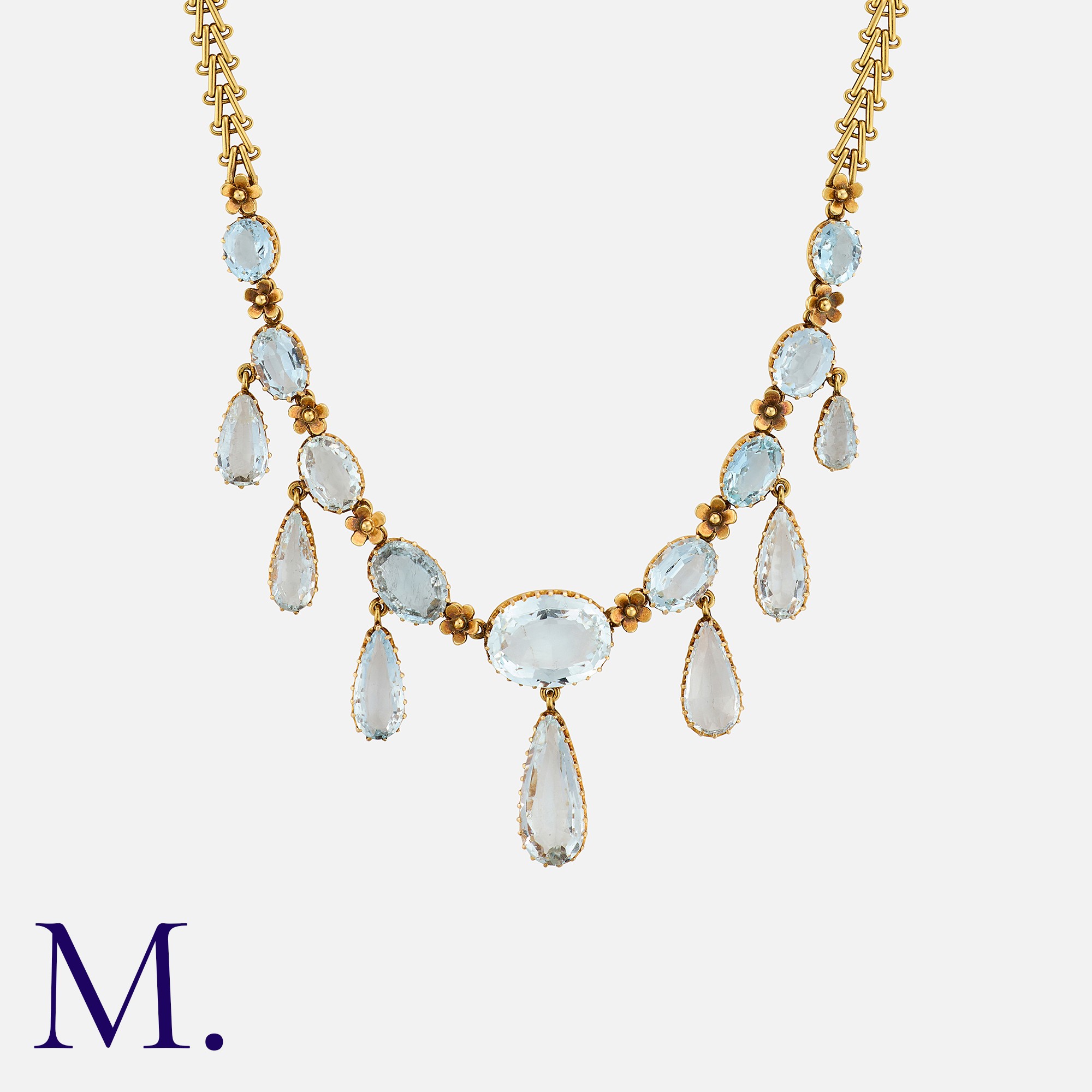 MRS NEWMAN, An Aquamarine Fringe Necklace in yellow gold, comprising a row of oval cut aquamarines - Image 2 of 2