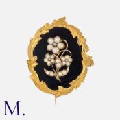 An Antique Enamel And Hairwork Mourning Brooch in yellow gold, decorated with black enamel and a