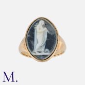 A Cameo Ring in yellow gold, set with a cameo depicting a woman. Unmarked, tests indicate 9 carat