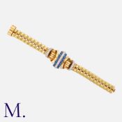 GUBELIN, A Retro Sapphire And Diamond Bracelet in 18k yellow gold and platinum. Comprising a