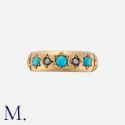 An Antique Turquoise and Pearl Gypsy Ring set three turquoise cabochons and two seed pearls in