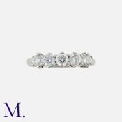 A Diamond Five Stone Ring in platinum, set with five round cut diamonds totalling approximately 1.