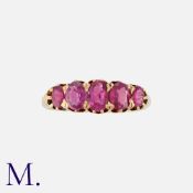 An Antique 5-Stone Ruby Ring in 18K yellow gold. comprising five graduated oval cut rubies.