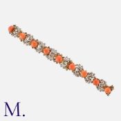 A Coral And Diamond Choker Necklace in yellow and white gold, comprising alternating scrolling