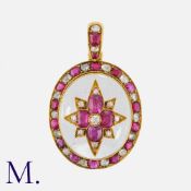 A Victorian Rock Crystal, Ruby And Diamond Pendant in yellow gold. Comprising a large rock crystal