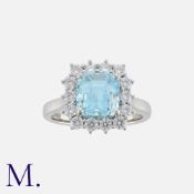 An Aquamarine and Diamond Ring in 18K white gold set with an octagonal cut aquamarine weighing