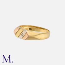 A Tricolour Gold And Diamond Ring in 18k rose, white and yellow gold, of striped design, set with