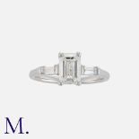 A 1.51ct Diamond Solitaire Ring in 18K white gold set with an emerald cut diamond weighing approx.