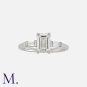 A 1.51ct Diamond Solitaire Ring in 18K white gold set with an emerald cut diamond weighing approx.