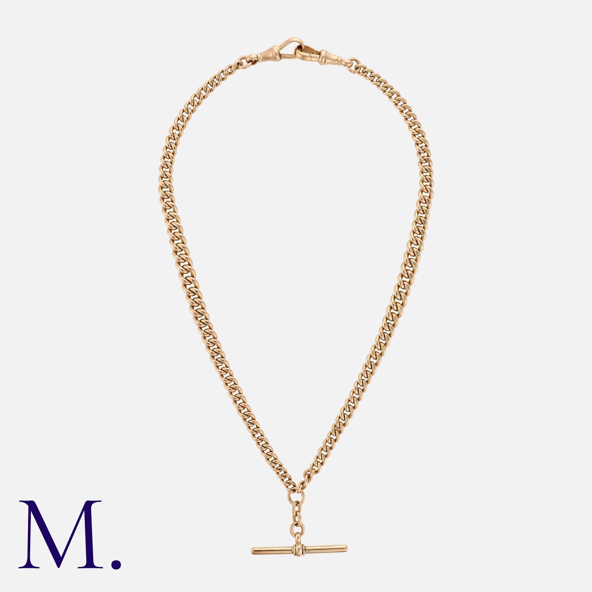 An Antique Albert Chain in 9K yellow gold with T-bar pendant and dog-clip fastenings. Stamped '9'