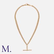 An Antique Albert Chain in 9K yellow gold with T-bar pendant and dog-clip fastenings. Stamped '9'