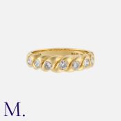 A Diamond Ring in 18K yellow gold, set with seven round brilliant cut diamonds (estimated G colour /