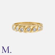 A Diamond Ring in 18K yellow gold, set with seven round brilliant cut diamonds (estimated G colour /