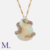 A Fine Opal and Diamond Snake Pendant Brooch and Chain with a large pear-shaped cabochon opal