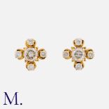 A Pair of Diamond Earrings in yellow gold set with round brilliant diamonds, the centre stones