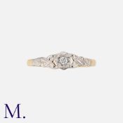 A Diamond Single Stone Ring in yellow gold and platinum set with a round cut diamond weighing