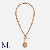 An Antique Albert Chain with Medallion in 9K rose gold with T-bar pendant and enamelled medallion