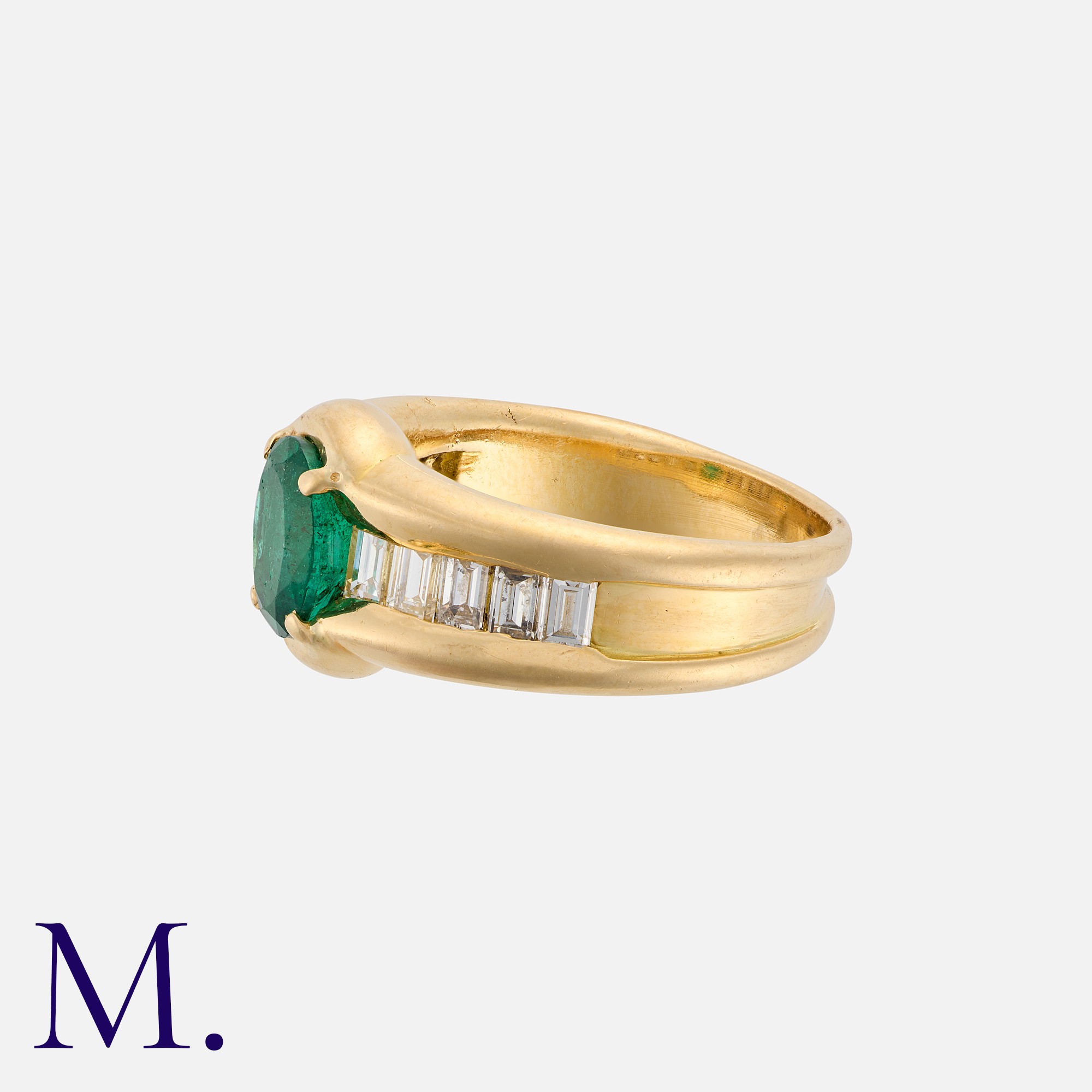 An Emerald and Diamond Ring in yellow gold, set with a forest green oval-cut emerald to the centre - Image 2 of 2