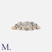 A Vintage Diamond Ring in 18k yellow gold and platinum, set with seven round cut diamonds, the
