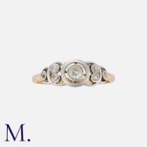 A Vintage Diamond Ring in 18k yellow gold and platinum, set with seven round cut diamonds, the