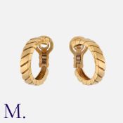 VAN CLEEF & ARPELS. A Pair of Earrings in 18K yellow gold with rope-work design. Signed VCA and