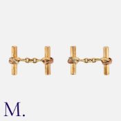 A Pair of Cufflinks in 9k yellow gold, of baton form, decorated with Russian wedding band motifs.