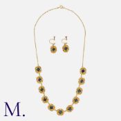 An Antique Sapphire & Pearl Necklace and Earrings in 9k yellow gold. Comprising eleven oval curt