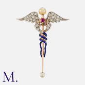 A Victorian Enamel, Pearl, Ruby And Diamond Caduceus Brooch comprising two entwined snakes with blue
