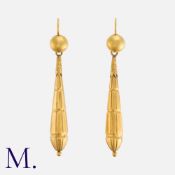 A Pair Of Drop Earrings in yellow gold, each of elongated drop design, with fluted decoration and