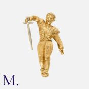 A Gold Brooch in 18k yellow gold, designed as a detailed engraved figure holding a sword. Marked 750