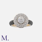 A Black And White Diamond Ring in 18k white gold, of cluster design, set with round cut white