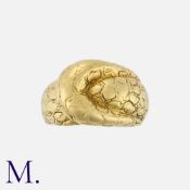 TIFFANY & Co, A Buckle Ring in 18k yellow gold, designed as an abstract, reptile skin textured