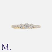 A Diamond 3-Stone Ring in yellow gold and platinum, set with three diamonds weighing approx. 0.07ct.
