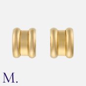 CHOPARD. A Pair of Gold Earrings in 18K yellow gold in a curved design with ridged borders. Signed