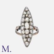 An Antique Diamond Marquise Ring in yellow gold and silver pavé set with rose diamonds to a marquise