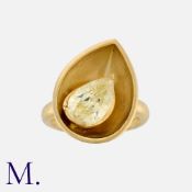 A 2.98 Carat Fancy Intense Yellow Diamond Ring in 18k yellow gold, comprising a stylised pear shaped