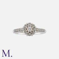 A Diamond Cluster Ring in 9K white gold, set with round cut diamonds weighing approx. 0.50ct in