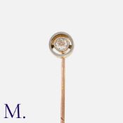 An Antique Diamond Stick Pin in yellow gold set with an old cut diamond weighing approx. 0.18ct.