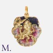 An Enamel Pendant in 18k yellow gold. Comprising an enamel pansy, decorated with a female figure