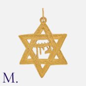 A Star Of David Pendant in yellow gold, the ornate engraved star depicting the word 'Zion' in Hebrew