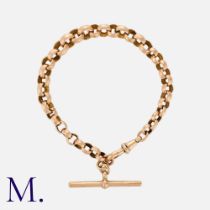 An Antique Fancy Link Bracelet in 9K rose gold, with nicely graduated faceted links with T-Bar