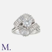 A Diamond Ballerina Ring in white gold, set centrally with a round cut diamond of approximately 0.
