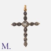 An Antique Rose Cut Diamond Cross Pendant in yellow gold and silver, designed as a crucifix, set