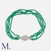 An Emerald And Diamond Bracelet in 18k white gold, comprising four rows of emerald beads,