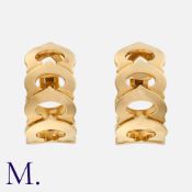 CARTIER. A Pair of C de Cartier Earrings (large size) in 18K yellow gold, with the repeating Cartier