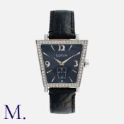 CORUM, A Diamond Trapeze Wristwatch the black dial with arabic numerals with a small seconds sub-
