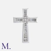 A Diamond Cross Pendant in 18k white gold, of crucifix form, set with round and baguette cut