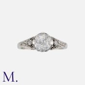 A Diamond Solitaire Ring in 18k white gold and palladium, set with a principal old cut diamond of