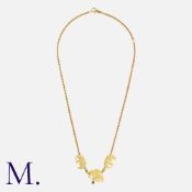 A Gold Necklace in 18k yellow gold, comprising a length of rope chain, set with three elephant